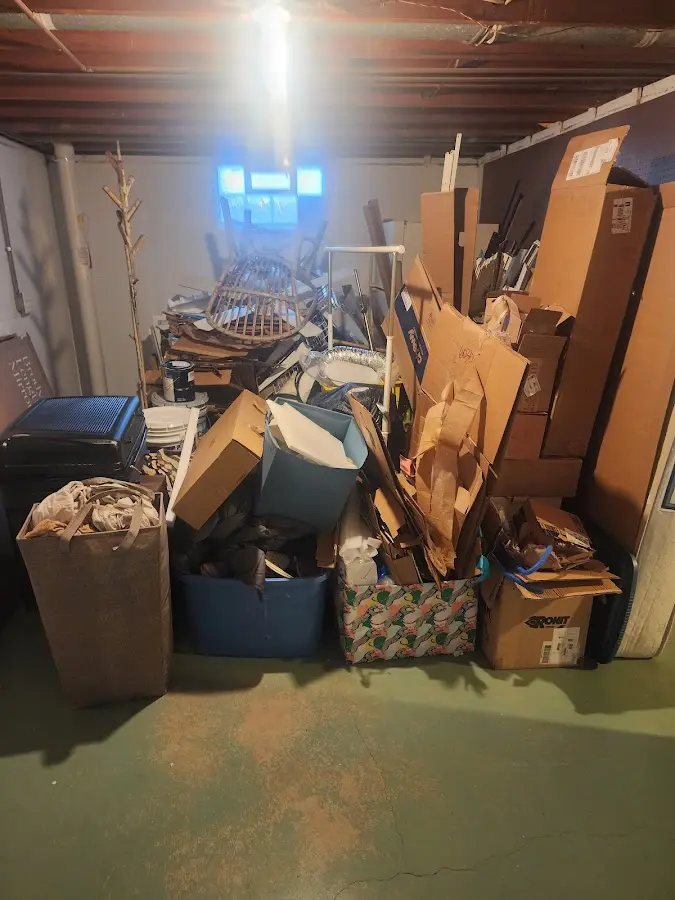 Roll-off dumpster container at job site for 2 Yard Dumpster Rental in Rapho